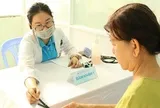 Người dân 19 xã, phường an toàn khu tại TPHCM được cấp thẻ BHYT miễn phí