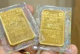 Vàng giảm, bán hay giữ?