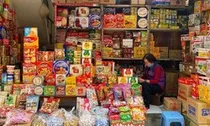Bán tạp hóa doanh thu 500 triệu đồng/năm, kê khai thuế 6 tháng một lần, chủ hộ có phải đóng BHXH bắt buộc không: Cơ quan BHXH trả lời