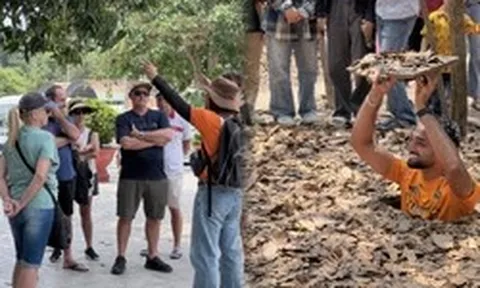 Khách Tây chăm chú nghe lịch sử tại Địa đạo Củ Chi ngày 30/4