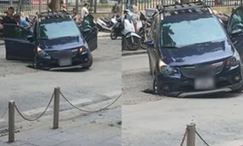 Ô tô sụt hố trước cổng Bệnh viện K Hà Nội