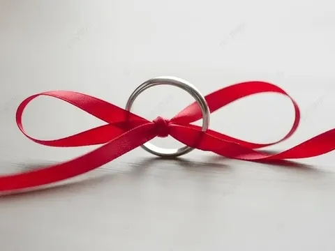 Tại sao khi nghỉ trong khách sạn nên mang theo dải ruy băng đỏ?