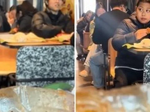 Mẹ mang đồ ăn ngoài vào McDonald's, con trai thà ngồi với người lạ chứ không ăn cùng mẹ