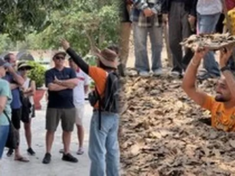 Khách Tây chăm chú nghe lịch sử tại Địa đạo Củ Chi ngày 30/4